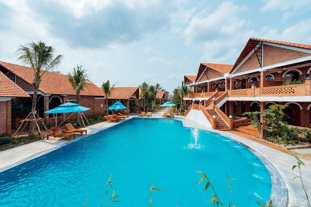 Swimming pool with water slide and fountain