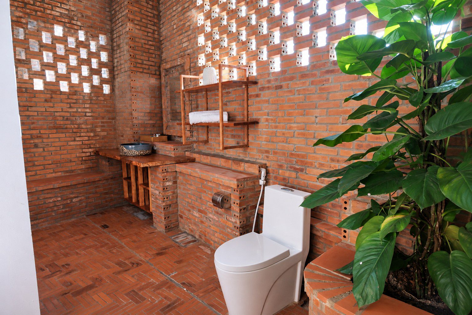 Bathroom with breeze-block wall
